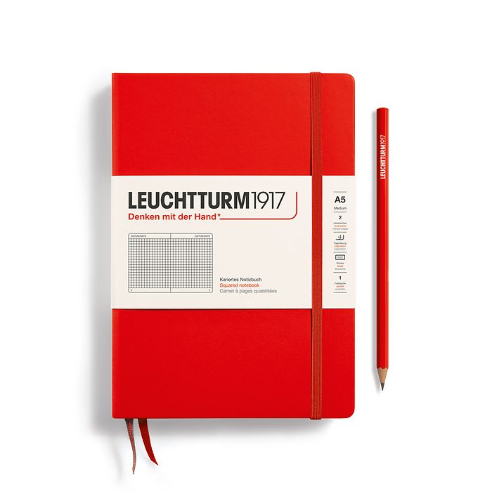 Carnet Medium (A5) couverture  rigide, 249 pages numérotées, quadrillé, rouge